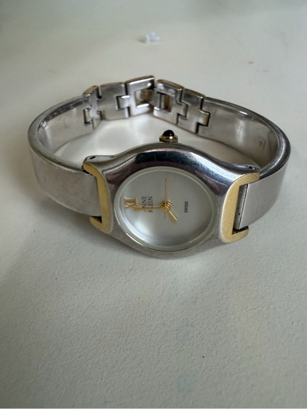 Anne Klein Silver and Gold-Tone Women's Bangle Watch